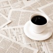 coffee over newspaper coffee over newspaper